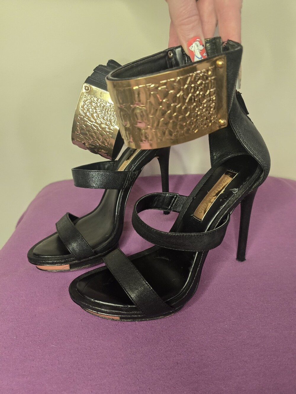 BCBGMaxAzria Black and Gold High Heel Sandals with Textured Cuff